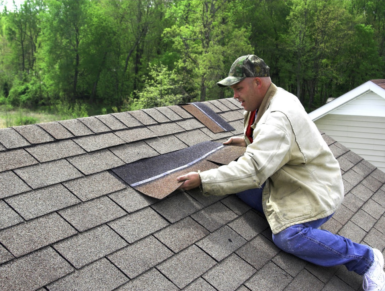 Applying Shingle Roofing | Amex Roofing and Drainage Ltd.